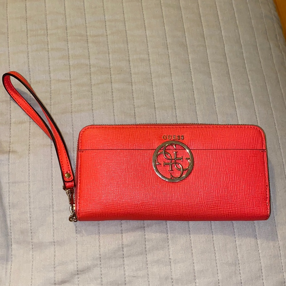 Guess wallet. Pink colored. One size.